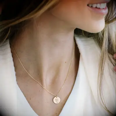 Gold carnation pendant from Made by Mary