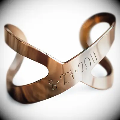 Personalized infinity bracelet with date stamp