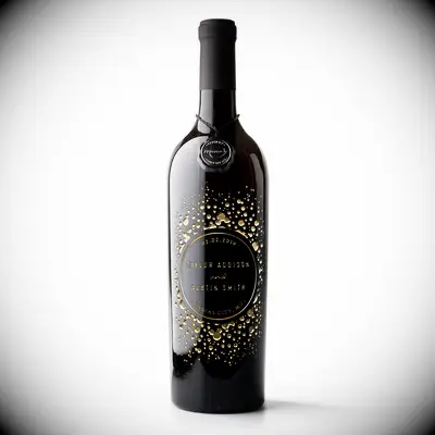Engraved black wine bottle