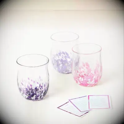 Set of colorful stemless wine glasses. 