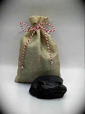 A piece of coal from Santa Claus for the best Christmas gag gift