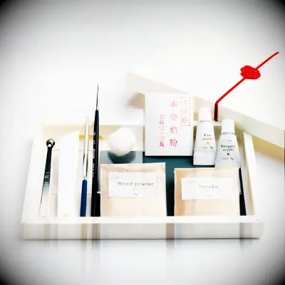 Kintsugi kit with materials to repair broken pottery for DIY anniversary gift