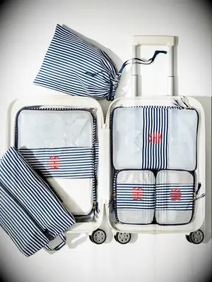 Monogrammed packing cubes from Mark & Graham
