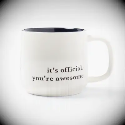 White ceramic mug with It