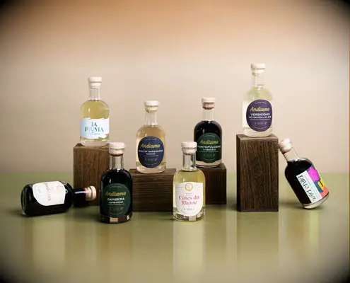 Assortment of various wines in small glass bottles thank-you gift