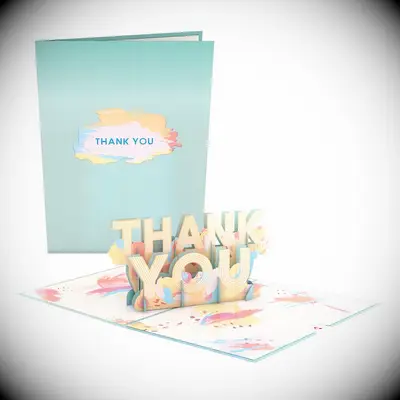 Light blue thank you card with a pop-up phrase thank-you gift
