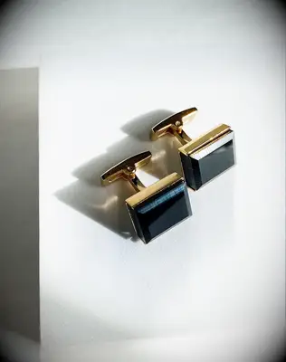 Black and gold cufflinks