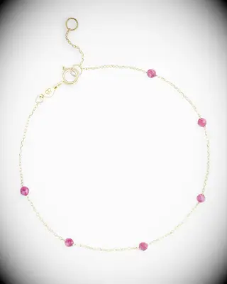 Gold and ruby stone bracelet