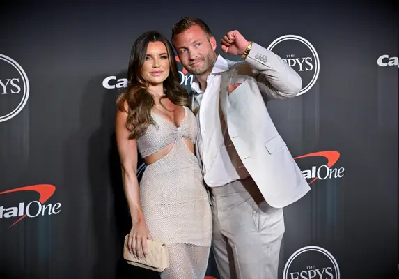 Veronika Khomyn and Sean McVay at a press event