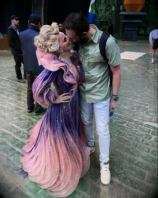 Kristin Chenoweth with her husband on the Wicked movie set