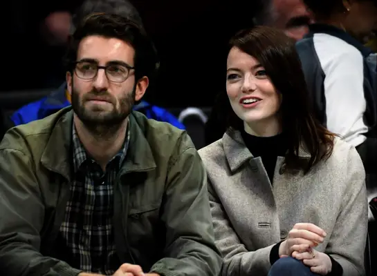 Emma Stone and Dave McCary at a basketball game