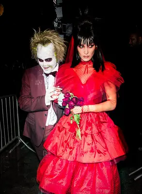 Bella Hadid and The Weeknd as Beetlejuice and Lydia Deetz