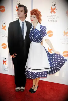 Lisa Rinna and Harry Hamlin as Lucy and Ricky Ricardo