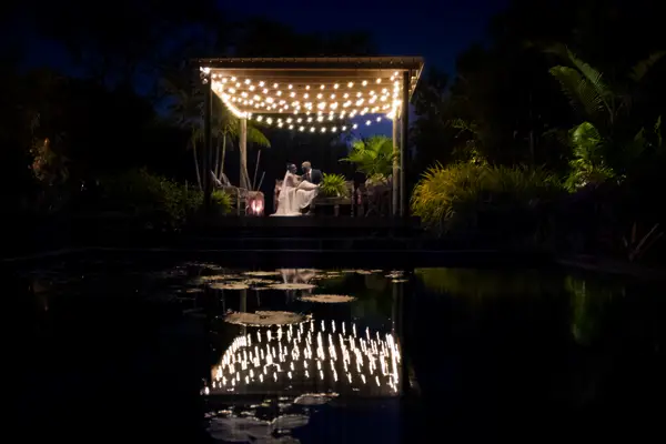 Mekia Cox and Britt Leach wedding reception venue with string lights
