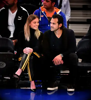Sydney Sweeney and Jonathan Davino courtside at a basketball game
