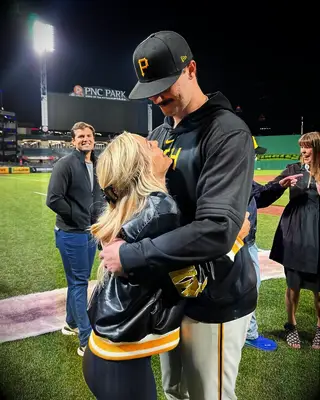 Paul Skenes with Livvy Dunne at his debut MLB game