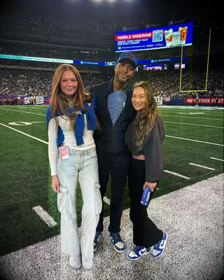 Michael Strahan and Kayla Quick go to a Football Game