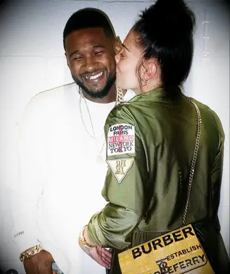 Usher and Jenn Goicoechea