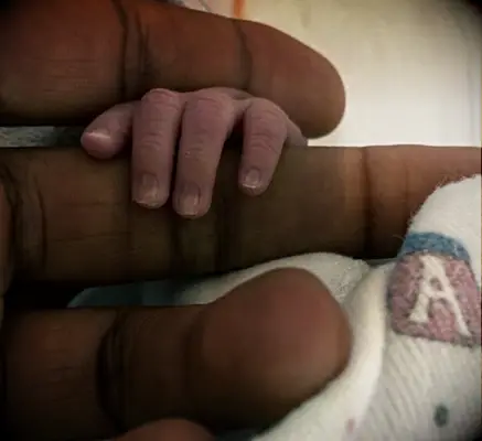 Usher and Jen have their first child