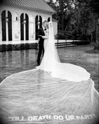 Justin and Haley kiss at their wedding. 