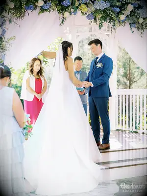 Mei Mei and Jacob exchanging vows during their wedding ceremony