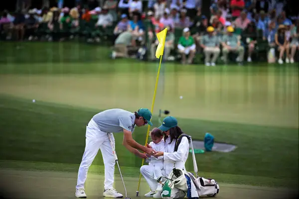 Rickie Fowler with wife Allison Stokke and daughter Maya at the Masters