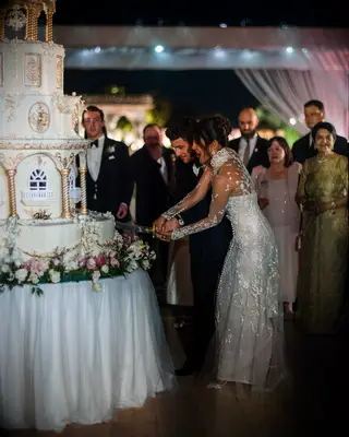 Priyanka Chopra and Nick Jonas cutting $19,000 wedding cake