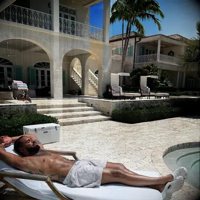Drake relaxing by the pool