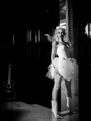 Gwen Stefani wearing wedding reception mini dress by Vera Wang