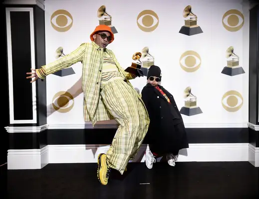 Anderson .Paak (L) and guest pose in the press room during the 61st Annual GRAMMY Awards