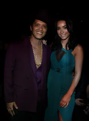 Bruno Mars and longtime girlfriend Jessica Caban. 