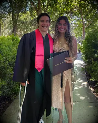 Olympic gymnast Brody Malone on graduation day with fiancée Serena Ortiz