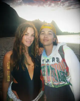 Hayley Kiyoko and Becca Tilley on the beach 
