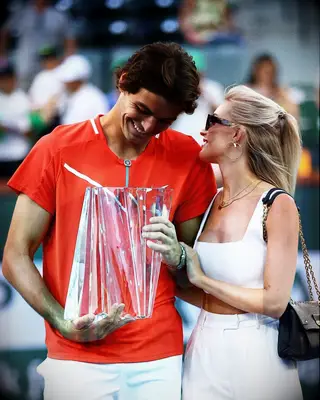 Morgan and Taylor pictured after Morgan wins the 2022 Indian Wells Masters. 
