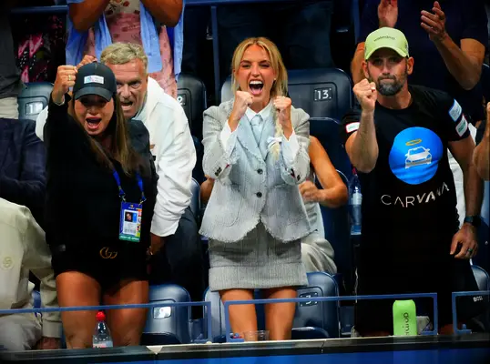 Morgan Riddle cheering for Taylor Fritz at the US Open