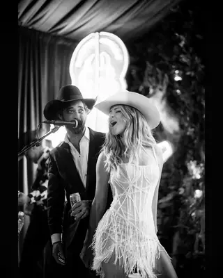 Yellowstone co-stars Hassie Harrison and Ryan Bingham in western attire on wedding day, 2025 wedding trends