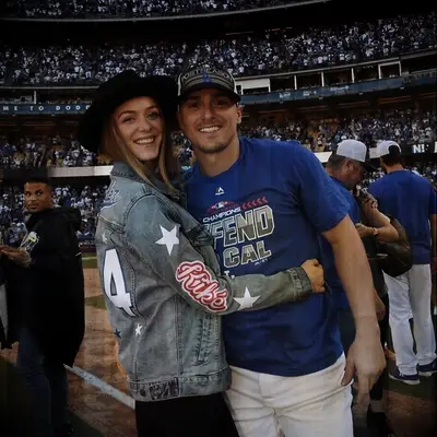 Kike and Mariana at a baseball game