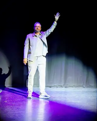 Nate Bargatze performing on his Big Dumb Eyes world tour