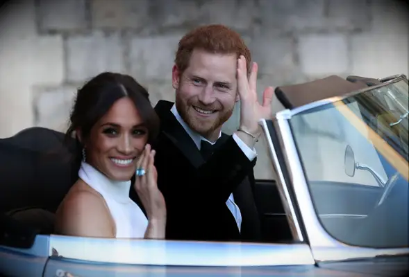 Meghan Markle and Prince Harry on their way to their wedding reception