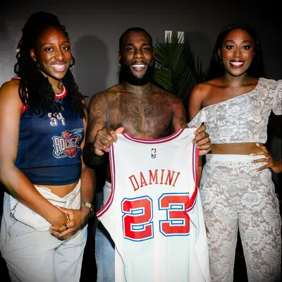 Chiney Ogwumike and sister Nneka Ogwumike with Burna Boy