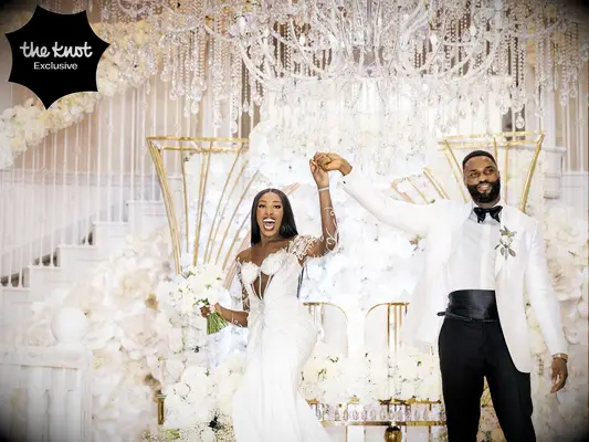 Chiney Ogwumike and husband Raphael at their church wedding reception