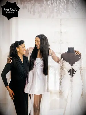 Chiney with her wedding dress designer Nneka Alexander 