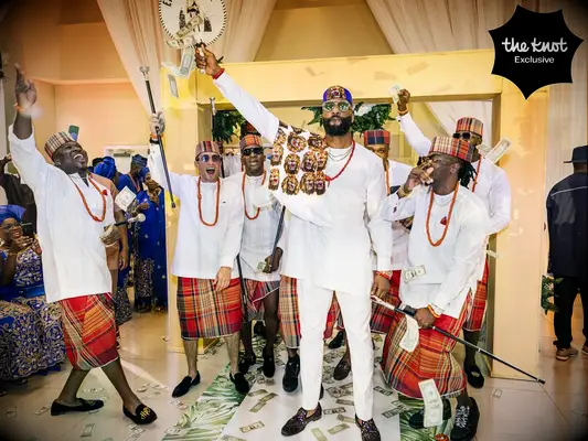 Raphael Akpejiori with his wedding party 