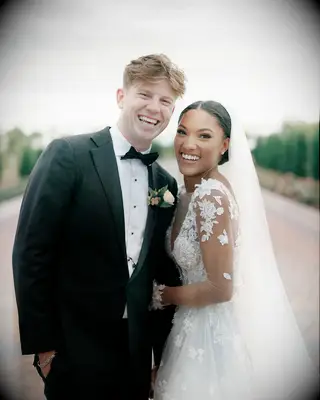 Tara Davis and Hunter Woodhall at their wedding