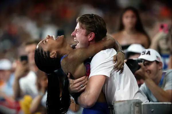 Tara Davis and husband Hunter Woodhall at the 2024 Olympics
