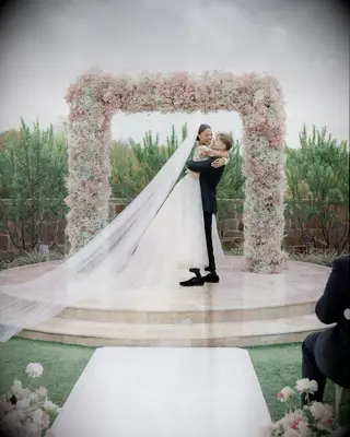 Tara Davis-Woodhall and Hunter Woodhall at their wedding