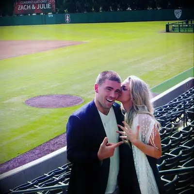Julie Ertz showing off her engagement ring and kissing Zach Ertz