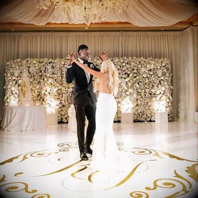Julius and Kendra Randle dancing at their wedding