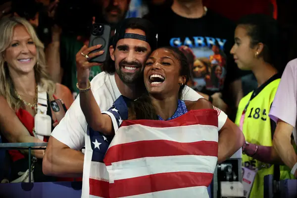 Gabby Thomas and Spencer McManes at the 2024 Olympics