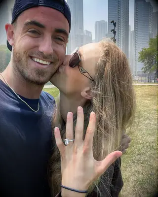 Chase Carter showing off her engagement ring with Cody Bellinger